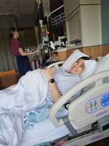 Ashley in the hospital bed after having her epidural