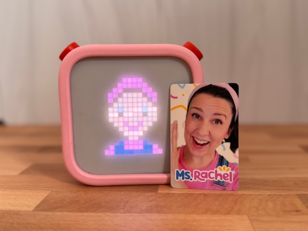 A Yoto player with a Ms. Rachel icon and a Ms. Rachel make-your-own card next to it